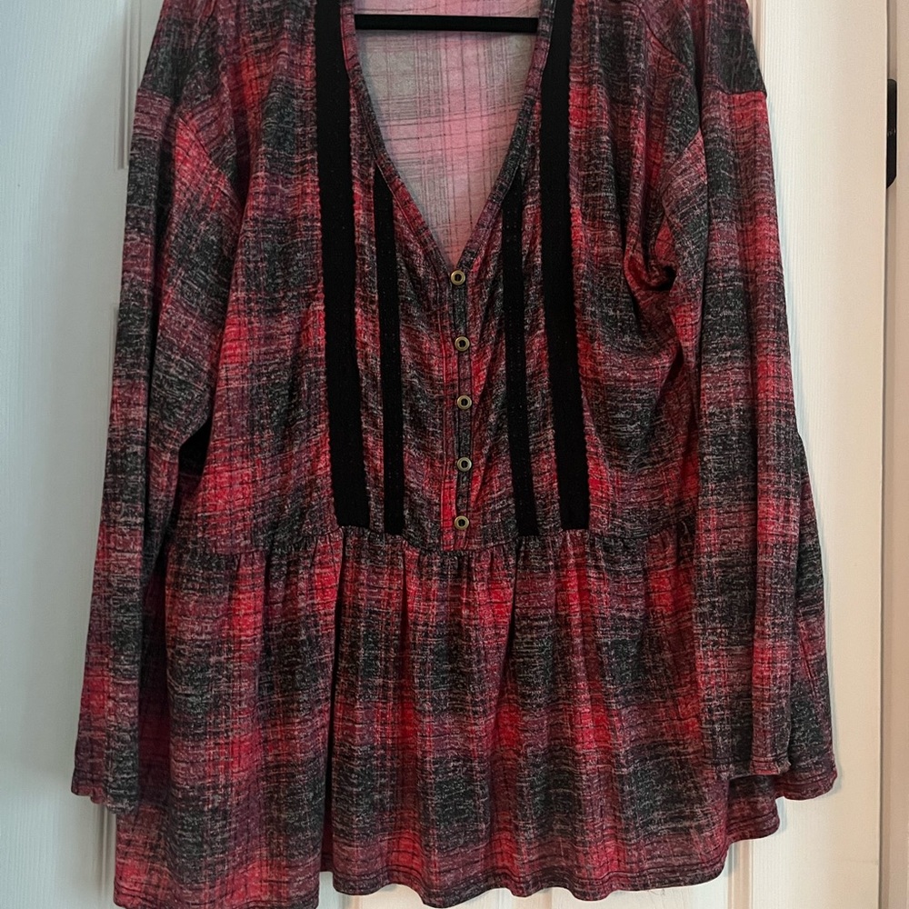 Maurice’s red and black top. Never worn